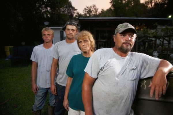 Junior Edwards with his wife and two sons.