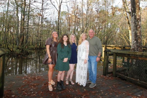 Ronnie and Jen with their three daughters.